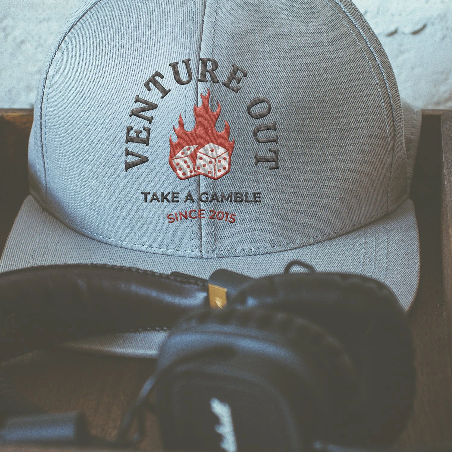 Venture Out embroidered cap with dice artwork